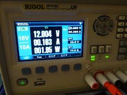 (Image: Bench power supply display showing power consumption of MiniDSP)