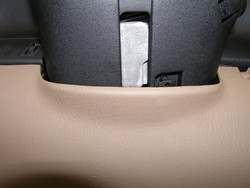 (Image: Closeup of lower steering column cover)