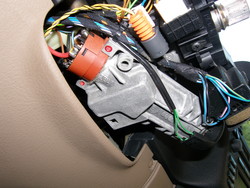 (Image: Closeup of underside of steering column iwth cover removed)
