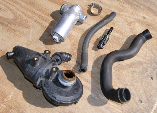 (Image: Old idle control valve, crankcase vent and temperature sensor)