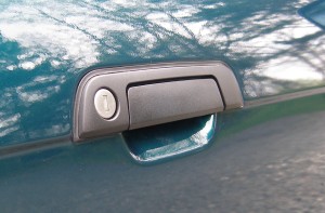 (Image: Closeup of door pull trim on exterior of door)