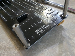 (Image: Closeup of PCB showing white-wire fix from rework)