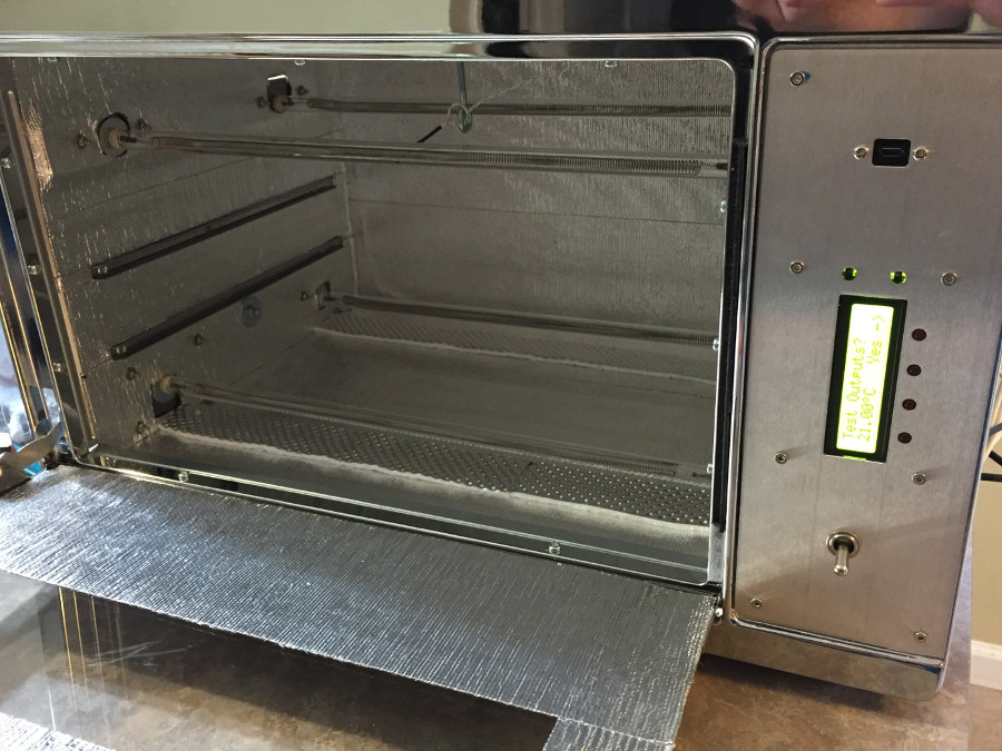 (Image: My custom reflow oven under testing)