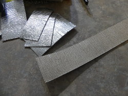 (Image: Closeup of adhesive side of fiberglass insulation)