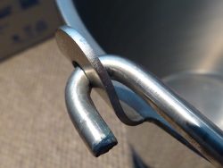 (Image: Closeup of 304 stainless bucket handle connection)