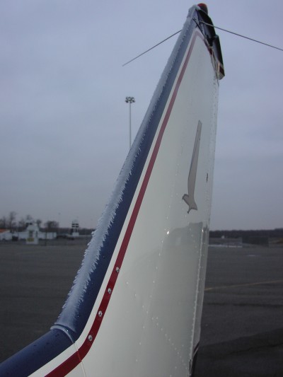 (Image: Ice on the vertical stabilizer)