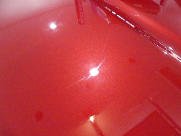 (Image: Closeup hood of C4 Corvette after detail)