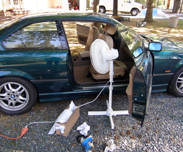 (Image: Interior being ventilated during fuel pump repair)