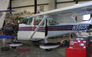 (Image: C172 in maintenance hangar for annual inspection)