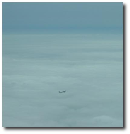 (Image: Jet climbing out of undercast)