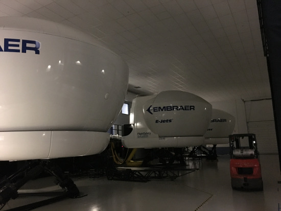 (Image: Lineup of 170/175 simulators at FlightSafety STL)