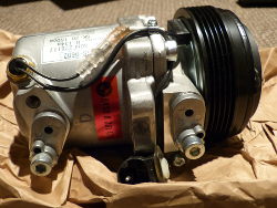 (Image: A new BMW OE Seiko AC compressor)