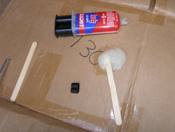 (Image: Mixing up a batch of 5 minute epoxy for door panel repair)