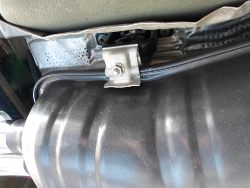 (Image: Closeup of exhaust hangar clamp and M3 muffler body)