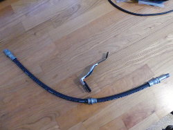 (Image: New brake line and bracket)