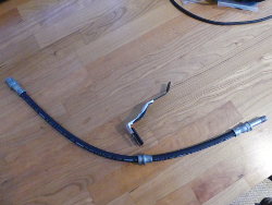 (Image: New brake line and bracket)