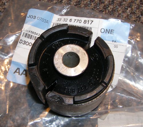 (Image: Closeup of new style rear trailing arm bushing)