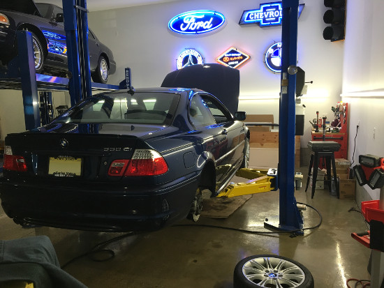 (Image: E46 on two post lift in prep for brake fluid flush)