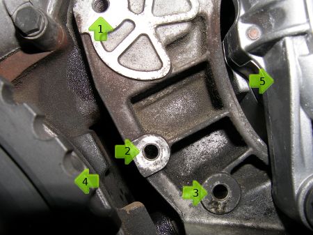 (Image: Closeup of parts associated with the hydraulic accessory belt tensioner)