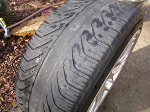 (Image: Michelin Pilot Sport A/S 235/40/18 worn past wear bars)