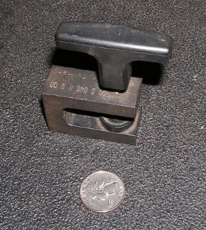 (Image: Closeup of seatbelt stop special tool)