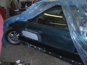 (Image: Sideswipe body work in progress - left side of vehicle)