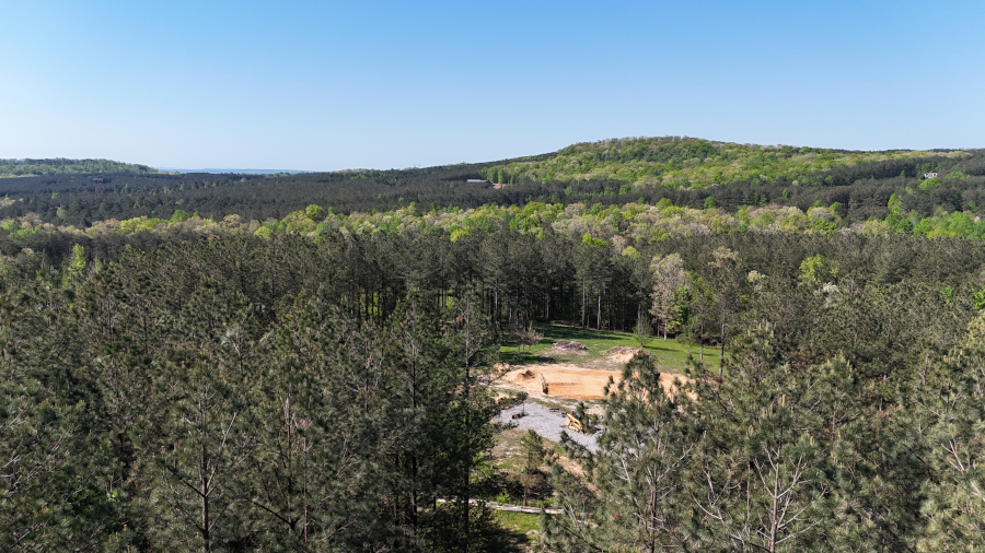 View above property looking out driveway
