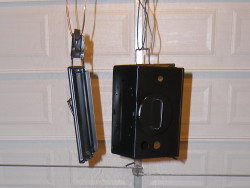 (Image: Parts hanging in the garage for paint)